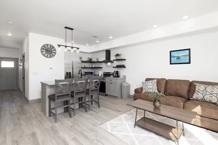 Open living room with leather couch
