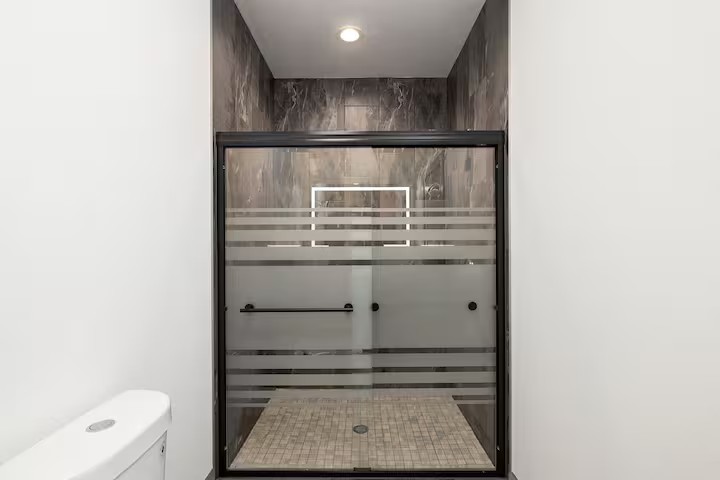 Glass-panel walk-in shower