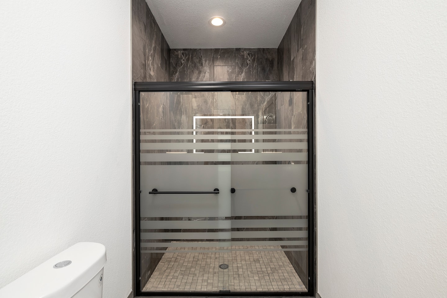 Glass-panel walk-in shower